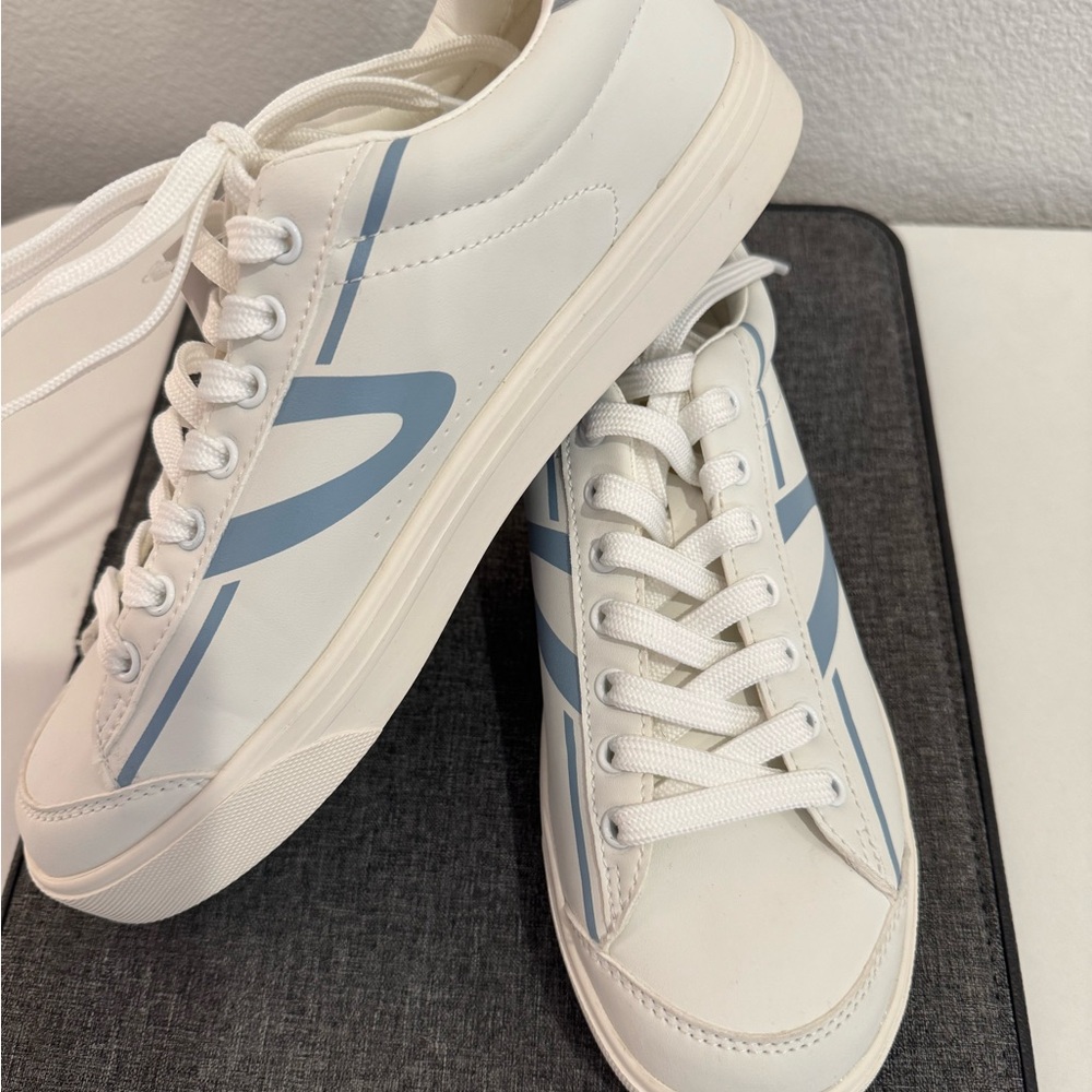 White Sneakers with Blue Accents